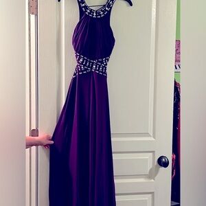 A size 7/8 Morgan & Co backless purple prom dress